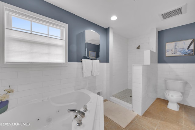 12 Diane Dr, Brick, NJ 08724 - bathroom featuring tile walls, a jetted tub, tile patterned flooring, walk in shower, and wainscoting