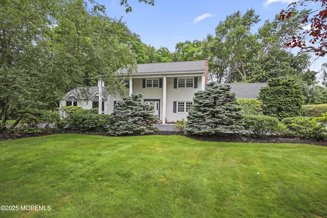 6 Stoecker Rd, Holmdel, NJ 07733 - rear view of house with a chimney and a yard