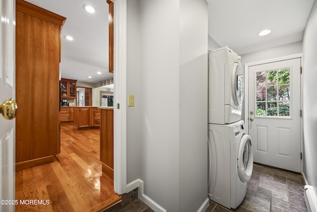 6 Stoecker Rd, Holmdel, NJ 07733 - laundry room featuring estacked washer and dryer, recessed lighting, and a baseboard heating unit