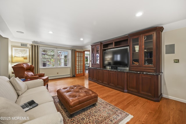6 Stoecker Rd, Holmdel, NJ 07733 - living area featuring a baseboard heating unit, light wood-type flooring, and recessed lighting