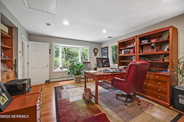 6 Stoecker Rd, Holmdel, NJ 07733 - home office with a baseboard heating unit, attic access, light wood-style flooring, and recessed lighting