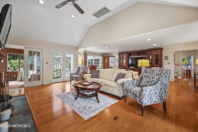 6 Stoecker Rd, Holmdel, NJ 07733 - living area featuring wood finished floors, ceiling fan, recessed lighting, french doors, and high vaulted ceiling