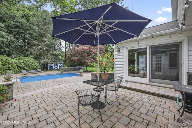 6 Stoecker Rd, Holmdel, NJ 07733 - view of patio / terrace featuring a shed and an outdoor pool