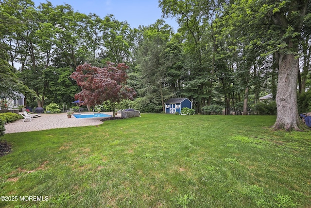 6 Stoecker Rd, Holmdel, NJ 07733 - view of grassy yard with a storage unit, an outdoor pool, and a patio