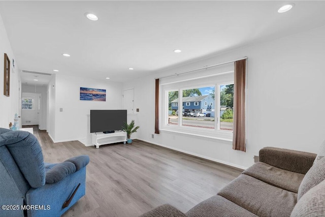 455 Drum Point Rd, Brick, NJ 08723 - living room featuring healthy amount of natural light, recessed lighting, and wood finished floors