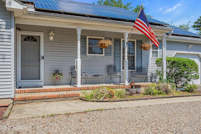414 Riverview Rd, Forked River, NJ 08731 - doorway to property with a porch and solar panels