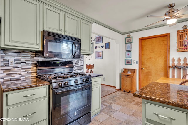414 Riverview Rd, Forked River, NJ 08731 - kitchen with black appliances, green cabinets, backsplash, ceiling fan, and dark stone counters