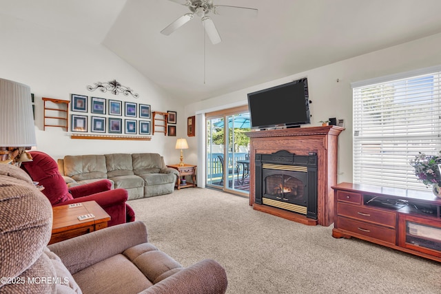 414 Riverview Rd, Forked River, NJ 08731 - living room with carpet, a ceiling fan, a lit fireplace, and high vaulted ceiling