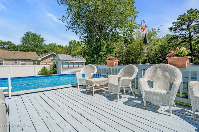414 Riverview Rd, Forked River, NJ 08731 - wooden deck with a storage unit