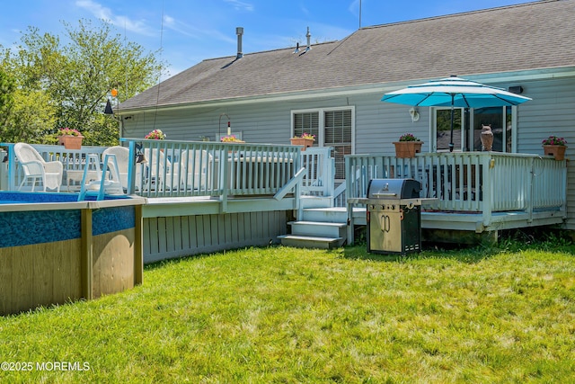 414 Riverview Rd, Forked River, NJ 08731 - back of property with a deck, a shingled roof, and a lawn