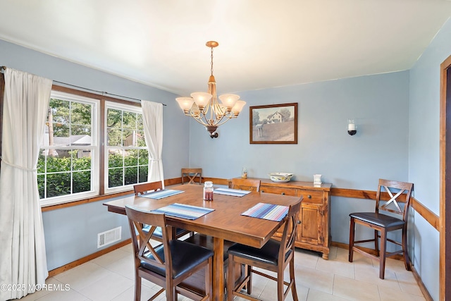 343 Clifton Ave, Bayville, NJ 08721 - dining room featuring a chandelier and light tile patterned floors