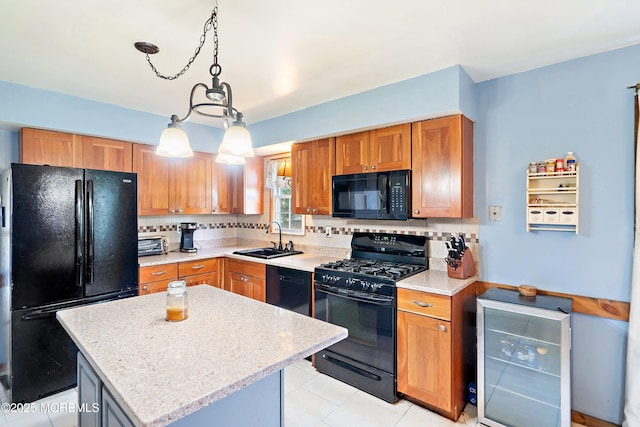 343 Clifton Ave, Bayville, NJ 08721 - kitchen with black appliances, beverage cooler, backsplash, a center island, and pendant lighting