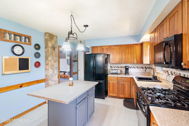 343 Clifton Ave, Bayville, NJ 08721 - kitchen featuring black appliances, a center island, hanging light fixtures, and light tile patterned floors