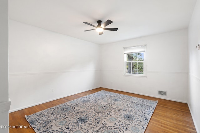 343 Clifton Ave, Bayville, NJ 08721 - empty room with ceiling fan and wood finished floors