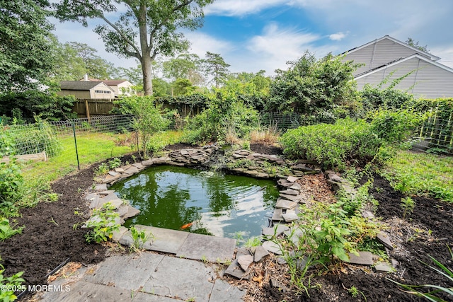 343 Clifton Ave, Bayville, NJ 08721 - view of yard with a small pond