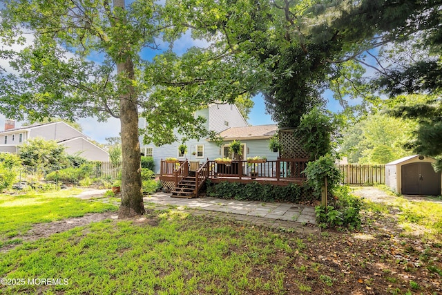 343 Clifton Ave, Bayville, NJ 08721 - back of property featuring a shed, a wooden deck, and a fenced backyard