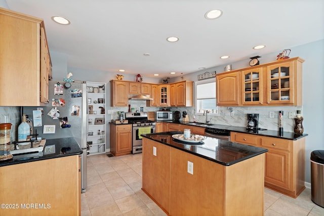 164 Morris Blvd, Beach Haven West, NJ 08050 - kitchen featuring appliances with stainless steel finishes, a center island, backsplash, glass insert cabinets, and recessed lighting