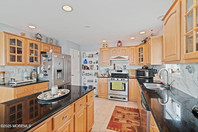 164 Morris Blvd, Beach Haven West, NJ 08050 - kitchen with stainless steel appliances, under cabinet range hood, tasteful backsplash, glass insert cabinets, and light tile patterned floors
