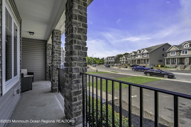7 Regal Ct, Lakewood, NJ 08701 - covered porch with a residential view