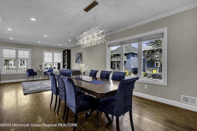 7 Regal Ct, Lakewood, NJ 08701 - dining area with crown molding, recessed lighting, wood finished floors, and a chandelier