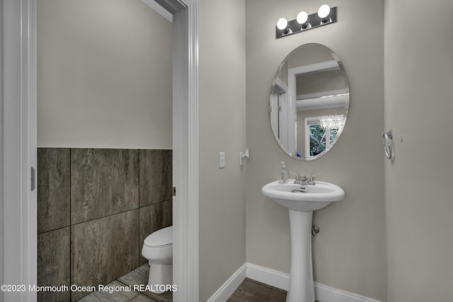7 Regal Ct, Lakewood, NJ 08701 - half bathroom with toilet and a sink