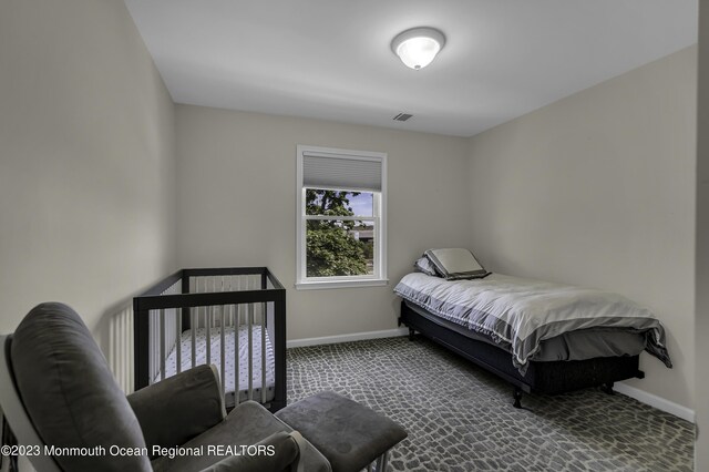 7 Regal Ct, Lakewood, NJ 08701 - carpeted bedroom featuring baseboards
