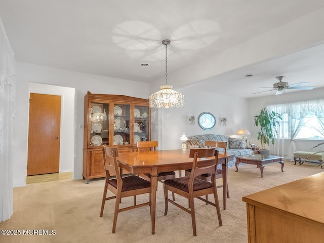 136 Georgetown Rd, Toms River, NJ 08757 - dining room with light carpet, plenty of natural light, a chandelier, and ceiling fan