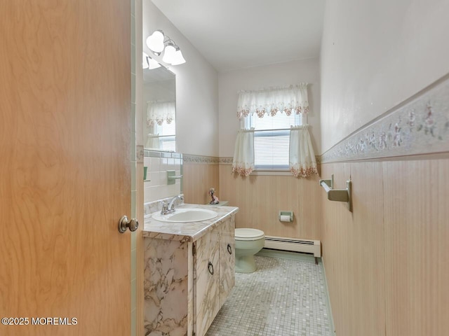 136 Georgetown Rd, Toms River, NJ 08757 - bathroom with a baseboard heating unit, a wainscoted wall, tile patterned flooring, and vanity
