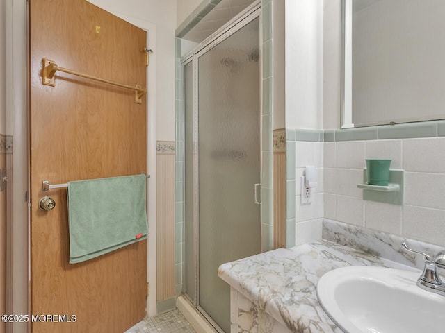 136 Georgetown Rd, Toms River, NJ 08757 - full bathroom featuring tile walls, a shower stall, and vanity