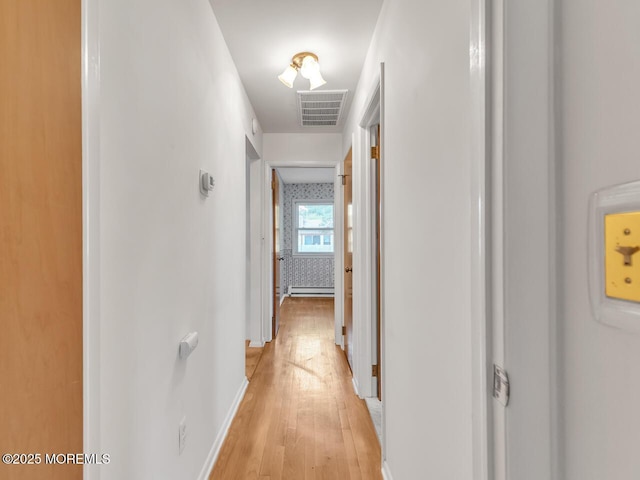 136 Georgetown Rd, Toms River, NJ 08757 - hall featuring light wood-style floors and a baseboard radiator