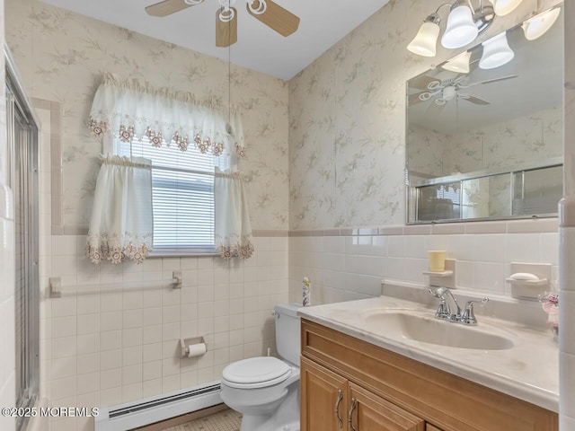 136 Georgetown Rd, Toms River, NJ 08757 - full bath featuring baseboard heating, ceiling fan, vanity, a stall shower, and tile walls