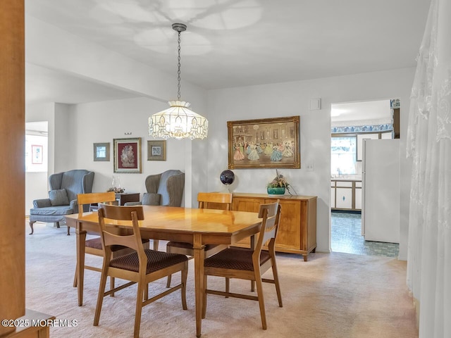 136 Georgetown Rd, Toms River, NJ 08757 - dining area with a chandelier and light carpet