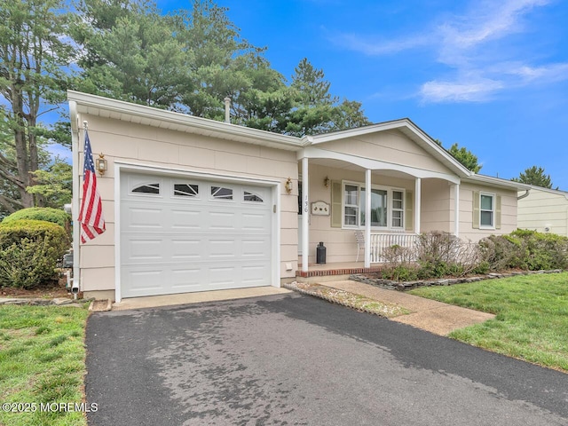 136 Georgetown Rd, Toms River, NJ 08757 - ranch-style house with a porch, an attached garage, and asphalt driveway