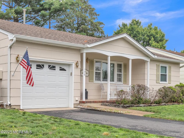 136 Georgetown Rd, Toms River, NJ 08757 - ranch-style home featuring covered porch, a garage, a shingled roof, and asphalt driveway