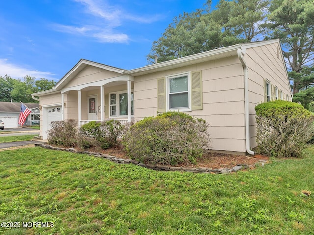 136 Georgetown Rd, Toms River, NJ 08757 - single story home with a garage, a front lawn, and covered porch