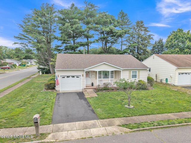 136 Georgetown Rd, Toms River, NJ 08757 - view of front of home with covered porch, a garage, a front yard, driveway, and a shingled roof