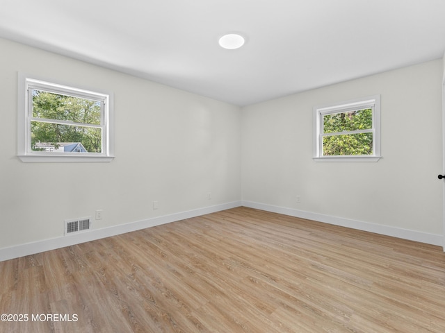 37 Bryant Dr, Jackson, NJ 08527 - spare room featuring plenty of natural light and wood finished floors