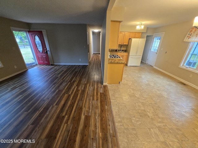 1236 Bewick St, Toms River, NJ 08753 - kitchen with freestanding refrigerator, open floor plan, light brown cabinets, and light countertops