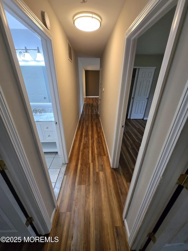 1236 Bewick St, Toms River, NJ 08753 - hallway featuring wood finished floors and baseboards