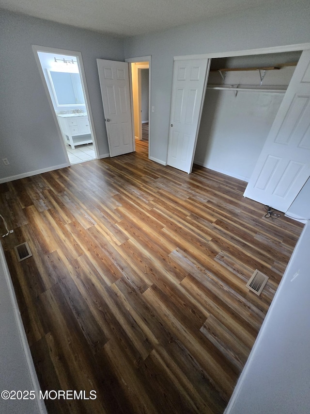1236 Bewick St, Toms River, NJ 08753 - unfurnished bedroom with wood finished floors and a closet
