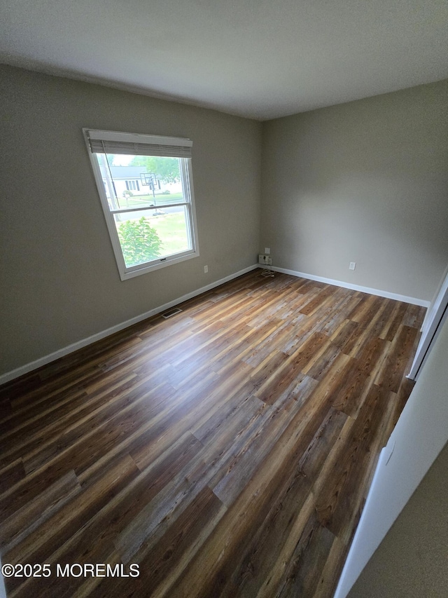 1236 Bewick St, Toms River, NJ 08753 - unfurnished room featuring dark wood-style floors and baseboards