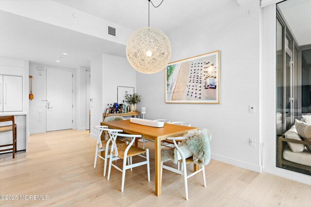 1101 Ocean Ave Unit 1404, Asbury Park, NJ 07712 - dining space featuring light wood-style floors and recessed lighting