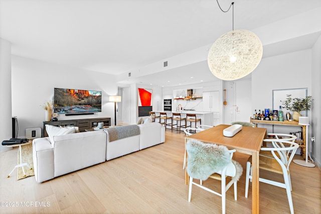 1101 Ocean Ave Unit 1404, Asbury Park, NJ 07712 - dining space featuring light wood-style floors and recessed lighting