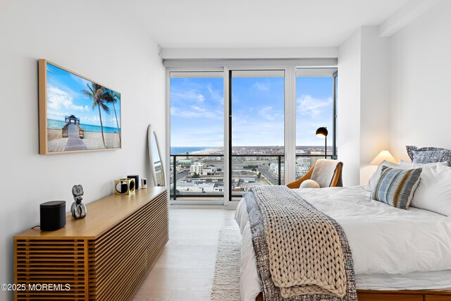 1101 Ocean Ave Unit 1404, Asbury Park, NJ 07712 - bedroom featuring wood finished floors