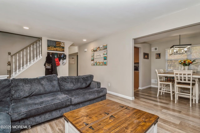 128 Oak Glen Rd, Toms River, NJ 08753 - living area with light wood-style floors, stairs, and recessed lighting