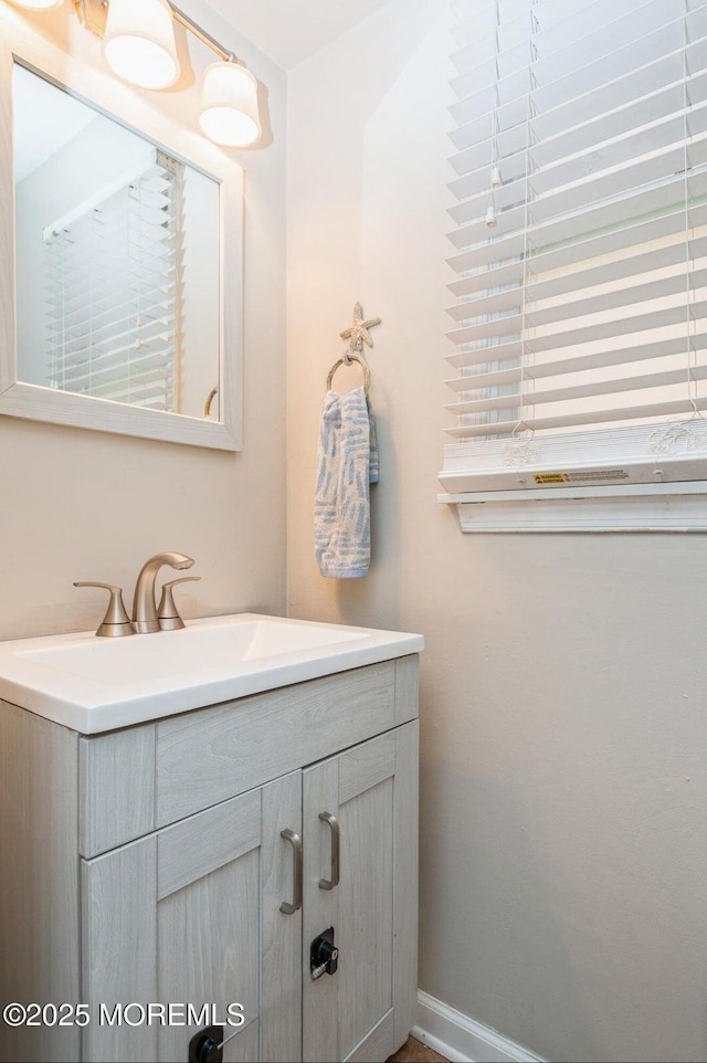 128 Oak Glen Rd, Toms River, NJ 08753 - bathroom with vanity and baseboards