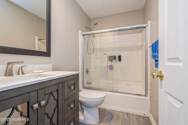 128 Oak Glen Rd, Toms River, NJ 08753 - bathroom featuring vanity, shower / bath combination with glass door, and wood finished floors