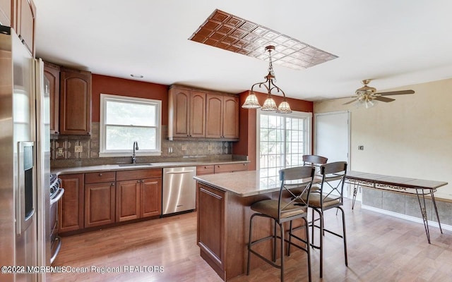 9 Tracy Pl, Jackson, NJ 08527 - kitchen with appliances with stainless steel finishes, light wood-type flooring, and healthy amount of natural light