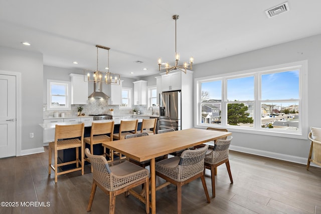 56 Gregg Dr, Beach Haven West, NJ 08050 - dining area featuring a chandelier, dark wood-style floors, and recessed lighting
