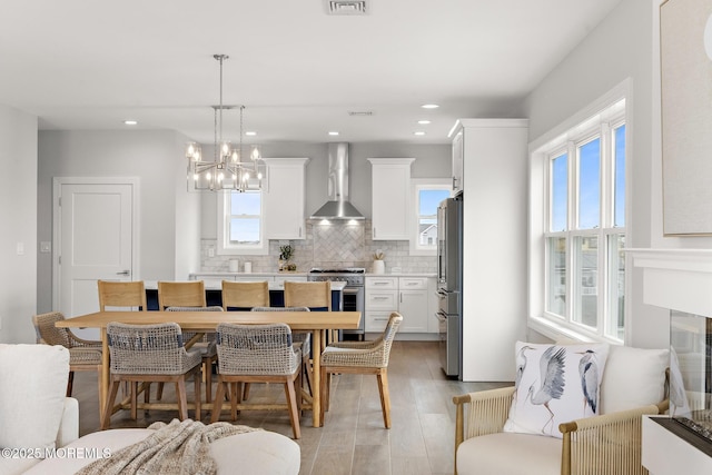 56 Gregg Dr, Beach Haven West, NJ 08050 - dining space with a chandelier, light wood finished floors, and recessed lighting